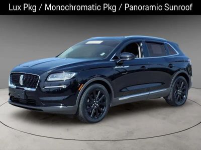 2023 Lincoln Nautilus Reserve in Infinite Black Metallic Clearcoat — front three-quarter view