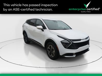 2025 Kia Sportage LX FWD — front three-quarter view