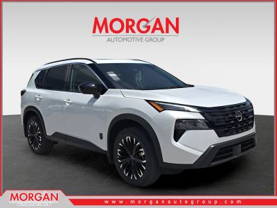 2026 Nissan Rogue Dark Armor in White — front three-quarter view