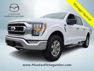 2021 Ford F-150 XLT in White — front three-quarter view