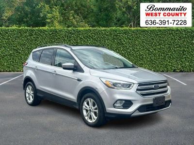 2018 Ford Escape SEL in Ingot Silver Meta — front three-quarter view