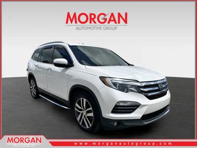 2018 Honda Pilot Elite in White — front three-quarter view