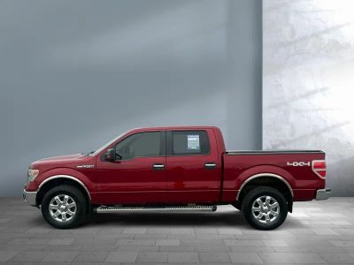 2014 Ford F-150 — rear three-quarter view
