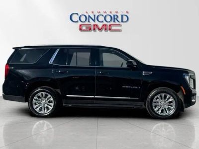 2025 GMC Yukon — rear three-quarter view