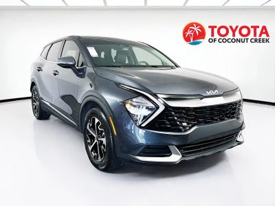 2023 Kia Sportage EX in Gravity Gray — front three-quarter view