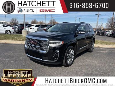 2023 GMC Acadia Denali in Ebony Twilight Metallic — front three-quarter view