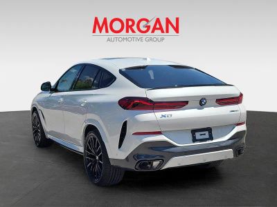 2027 BMW X6 — rear three-quarter view
