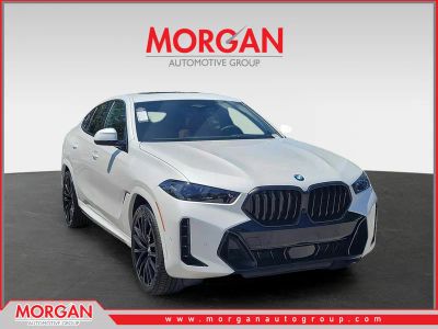 2027 BMW X6 xDrive40i in Mineral White Metallic — front three-quarter view