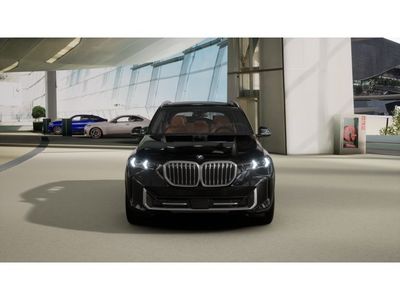 2026 BMW X5 — rear three-quarter view