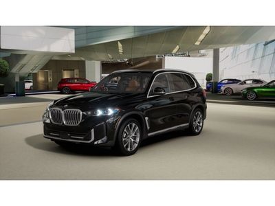 2026 BMW X5 xDrive40i in Black Sapphire Metallic — front three-quarter view
