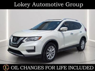 2018 Nissan Rogue SV in Pearl White — front three-quarter view