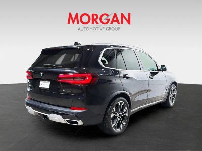 2021 BMW X5 — rear three-quarter view
