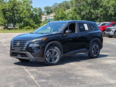 2024 Nissan Rogue SV in Black — front three-quarter view