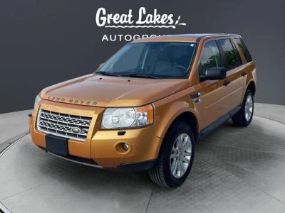 2008 Land Rover LR2 SE in Burnt Orange — front three-quarter view