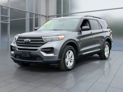 2023 Ford Explorer XLT in Gray Metallic — front three-quarter view