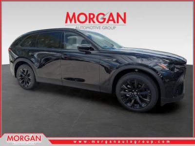 2026 Mazda CX-90 Premium Sport in Jet Black Mica — front three-quarter view