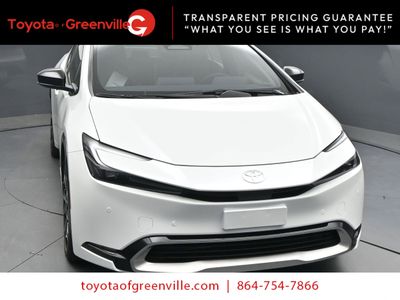 2025 Toyota Prius Plug-in Hybrid XSE Hatchback — rear three-quarter view
