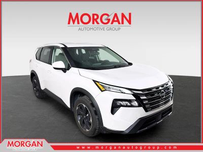 2024 Nissan Rogue SV in Glacier White — front three-quarter view