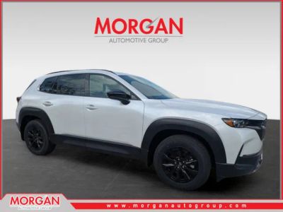 2026 Mazda CX-50 Hybrid Premium in Wind Chill Pearl — front three-quarter view