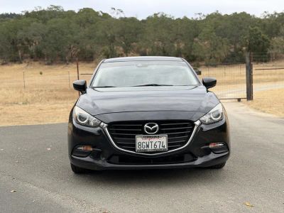 2018 Mazda MAZDA3 — rear three-quarter view