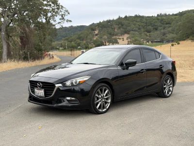 2018 Mazda MAZDA3 in Black — front three-quarter view