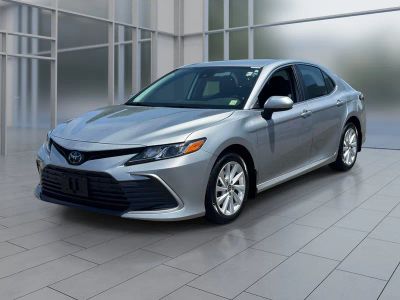 2023 Toyota Camry LE in Celestial Silver Metallic — front three-quarter view