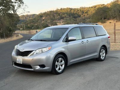 2011 Toyota Sienna in Gray — front three-quarter view