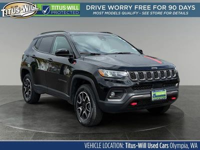 2024 Jeep Compass Trailhawk in Diamond Black Crystal Pearlcoat — front three-quarter view