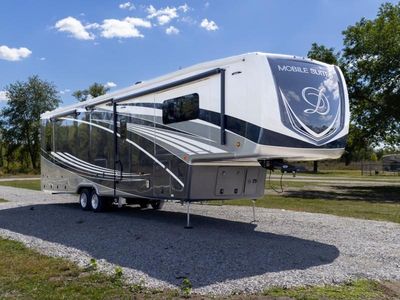 2021 DRV Luxury Suites Mobile Suites — front three-quarter view