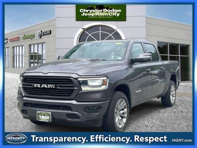 2023 RAM 1500 Laramie Crew Cab 4x4 5'7' Box in Granite Crystal Metallic Clearcoat — front three-quarter view