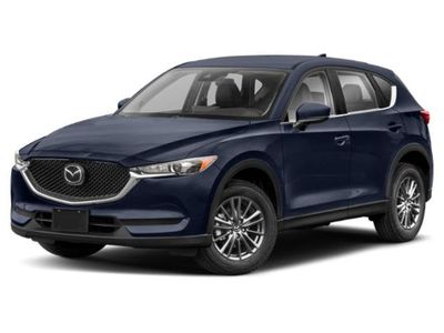 2021 Mazda CX-5 Touring in Soul Red Crystal Metallic — front three-quarter view