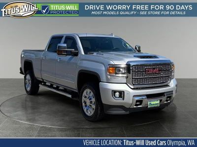 2019 GMC Sierra 2500HD Denali in Quicksilver Metallic — front three-quarter view