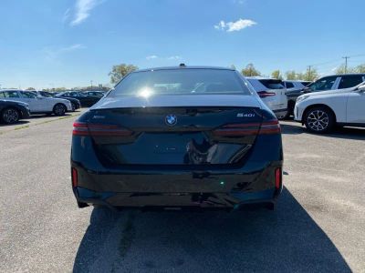 2027 BMW 5 Series — rear three-quarter view