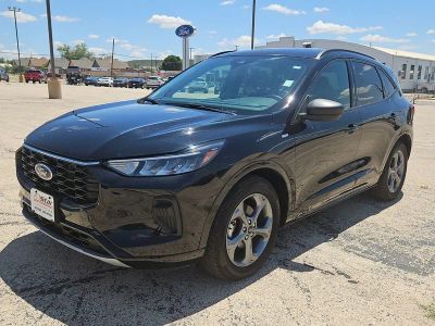 2024 Ford Escape ST-Line in Black Metallic — front three-quarter view