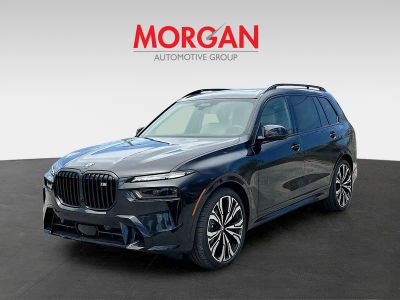 2026 BMW X7 — rear three-quarter view