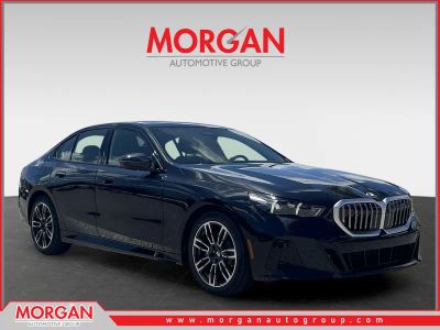 2027 BMW 5 Series 530i in Black — front three-quarter view