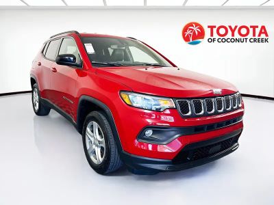 2023 Jeep Compass Latitude in Redline Pearlcoat — front three-quarter view