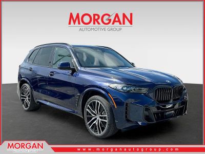 2026 BMW X5 sDrive40i in Tanzanite Blue II Metallic — front three-quarter view