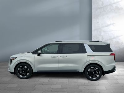 2026 Kia Carnival — rear three-quarter view