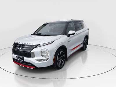 2024 Mitsubishi Outlander Plug-In Hybrid — rear three-quarter view