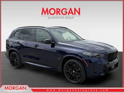 2026 BMW X5 M60i in Blue — front three-quarter view