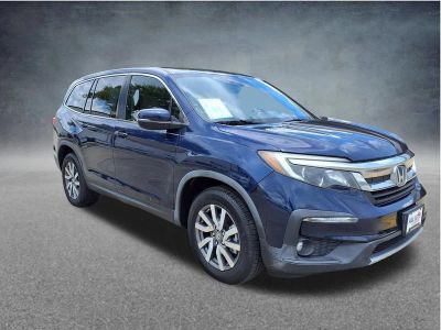 2019 Honda Pilot — rear three-quarter view