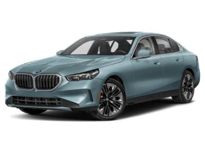 2026 BMW 5 Series 530i in Cape York Green Metallic — front three-quarter view