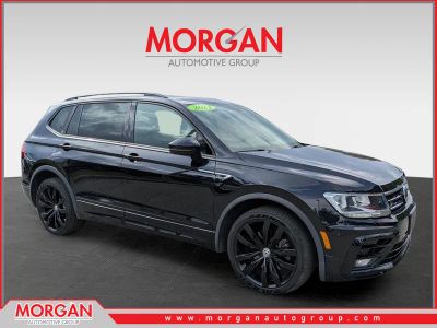 2021 Volkswagen Tiguan SE R-Line Black in Deep Black Pearl — front three-quarter view