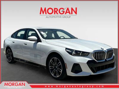 2027 BMW 5 Series 530i xDrive in Mineral White Metallic — front three-quarter view