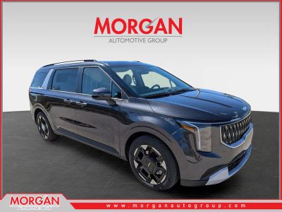 2026 Kia Carnival EX in Panthera Metal — front three-quarter view