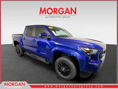 2025 Toyota Tacoma SR5 in Blue Crush Metallic — front three-quarter view
