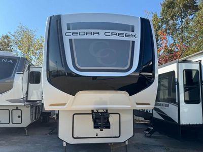 2023 Forest River Cedar Creek — side profile view