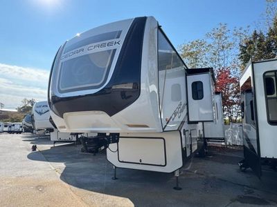 2023 Forest River Cedar Creek — rear three-quarter view