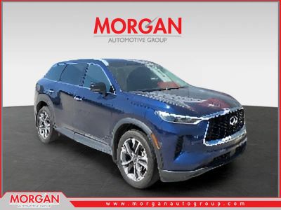 2025 INFINITI QX60 LUXE in Blue — front three-quarter view